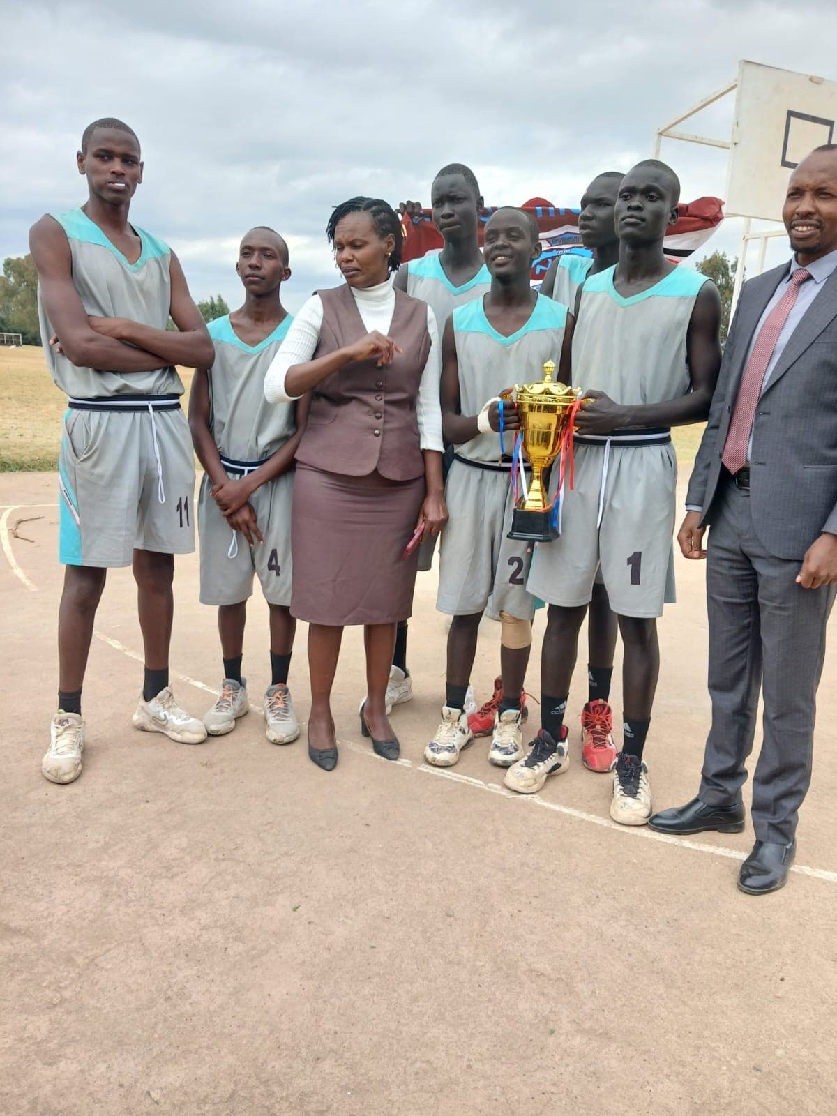 Basketball Team with the Trophy